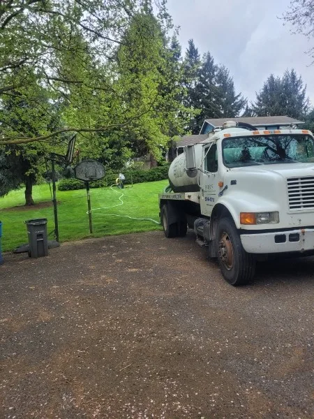 Bob's Septic Service truck pumping a residential septic system in Clark County, Washington.